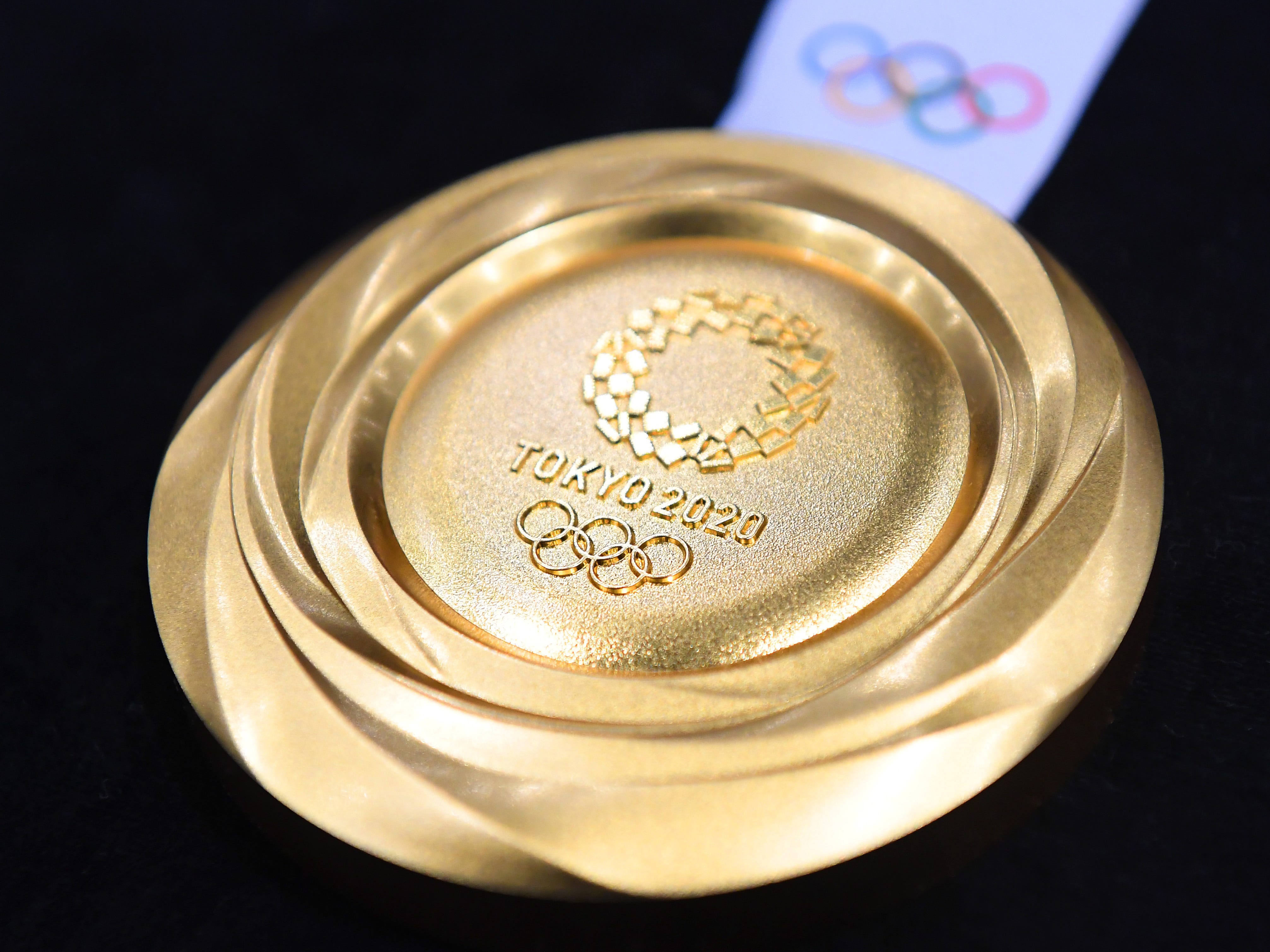 Another angle of the gold medal for the 2020 Summer Olympics.