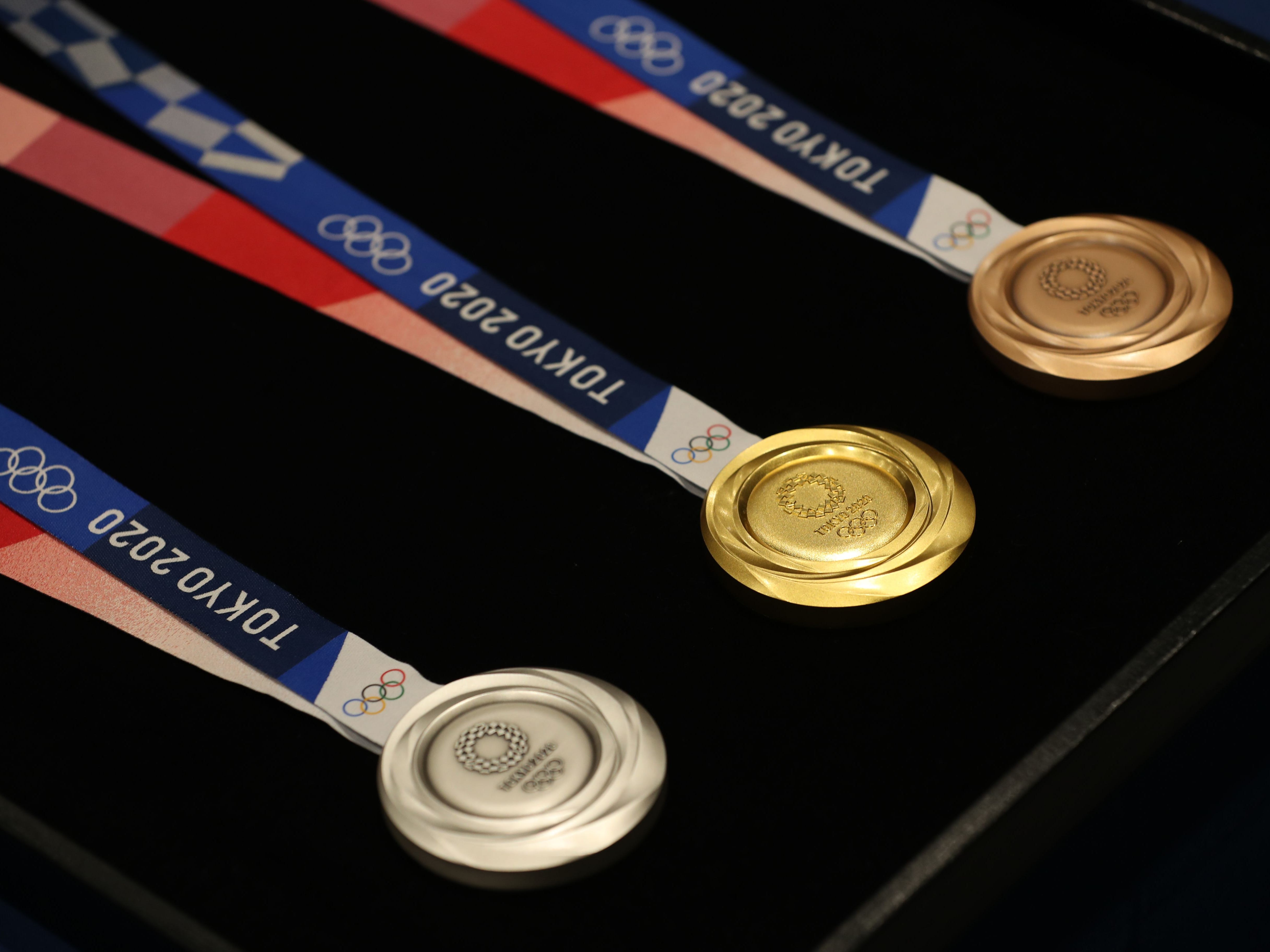 The three medals that will be awarded at the 2020 Summer Olympics.