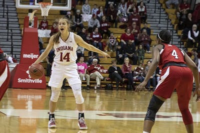 Junior Ali Patberg points at an open area on the court Feb. 27 in Simon Skjodt Assembly Hall. Patberg led the Hoosiers to victory over the Wolverines on March 1 with 21 points.