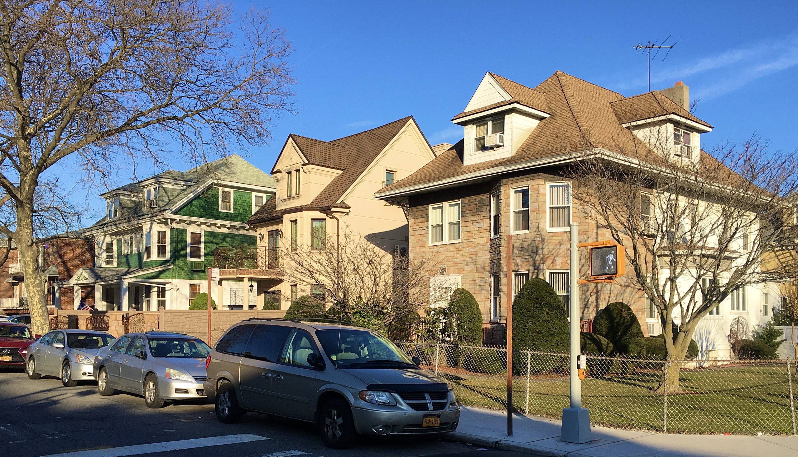 Handsome homes line Bay 25th Street on the corner of Benson Avenue. Photo: Lore Croghan/Brooklyn Eagle