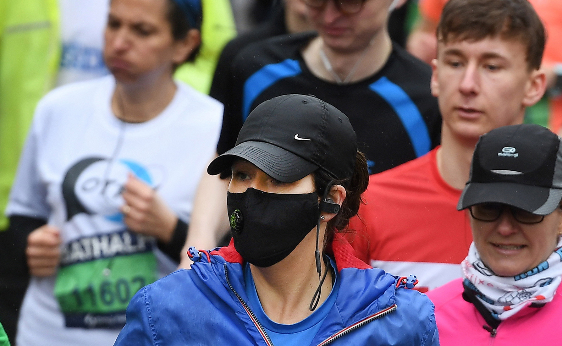  One concerned Bath runner wore a mask for the event as thousands packed onto the streets