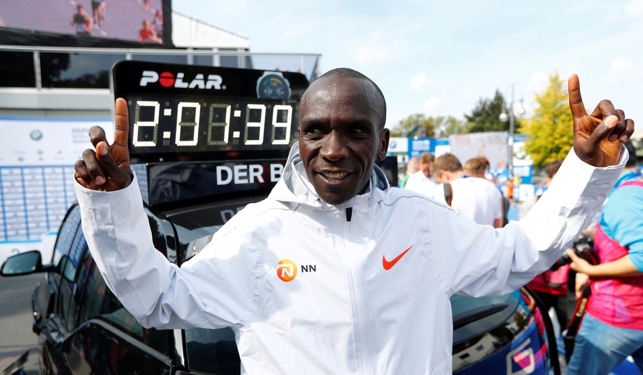 Kenya's Eliud Kipchoge celebrates winning the Berlin Marathon in world record-breaking time. He wore Vaporfly. Photo: Reuters