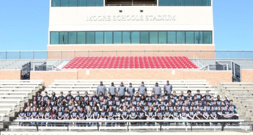 Photo - The Moore High School track team shortly before the coronavirus pandemic ended the 2020 season. [LIFE HAPPENS PHOTOGRAPHY] 