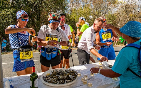 Competitors fuel themselves with oysters and white wine