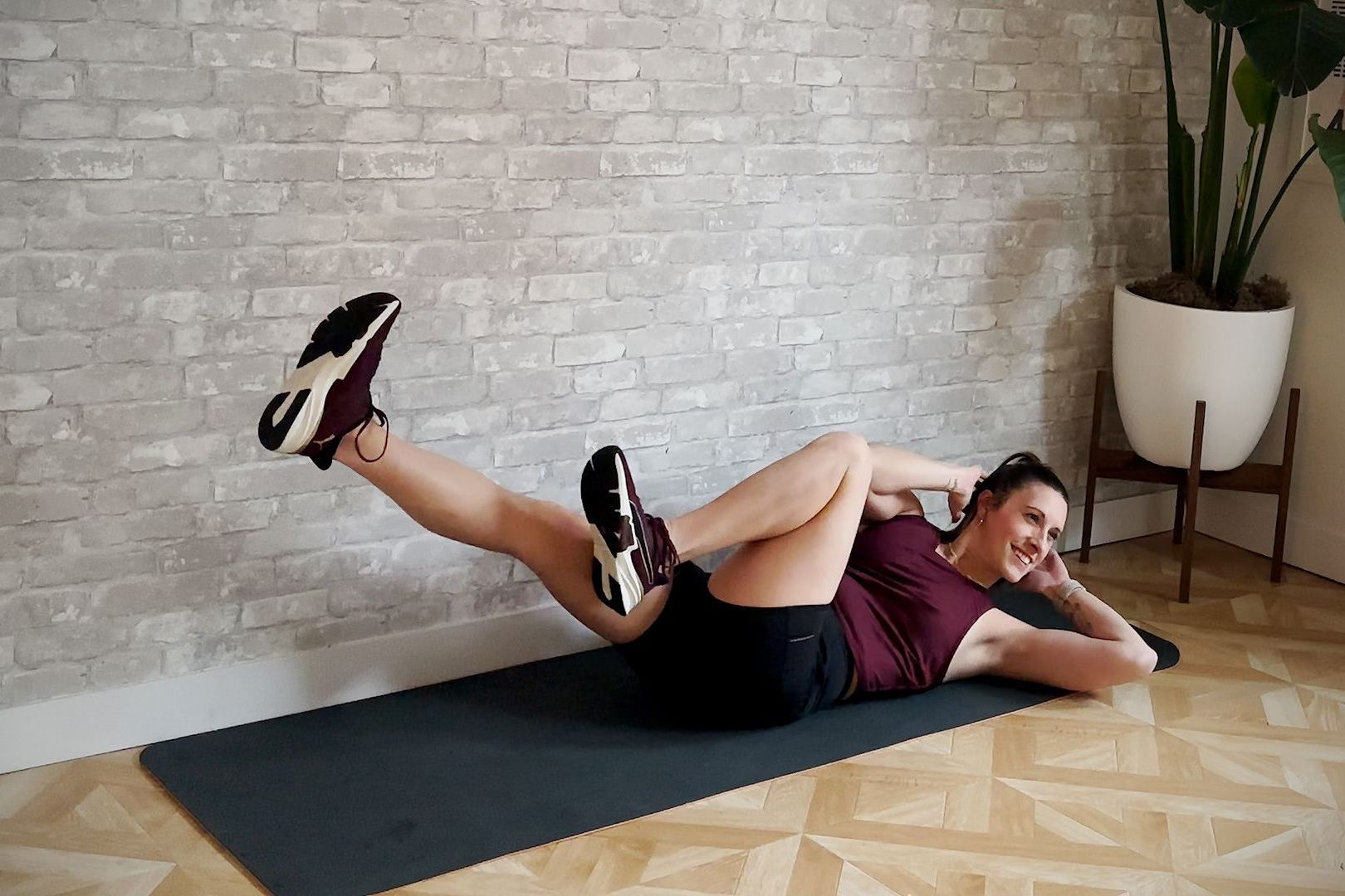 aerobic workout, amber rees practices bicycle exercise