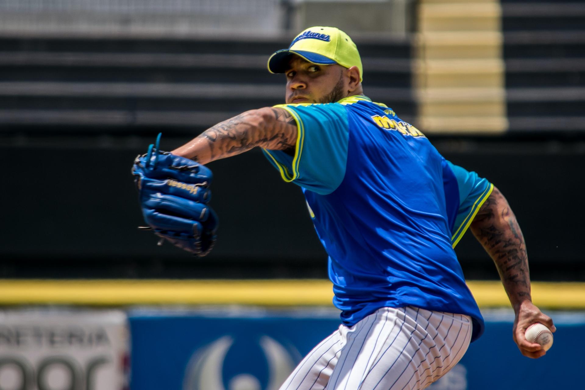 Action shot of baseball player throwing a baseball