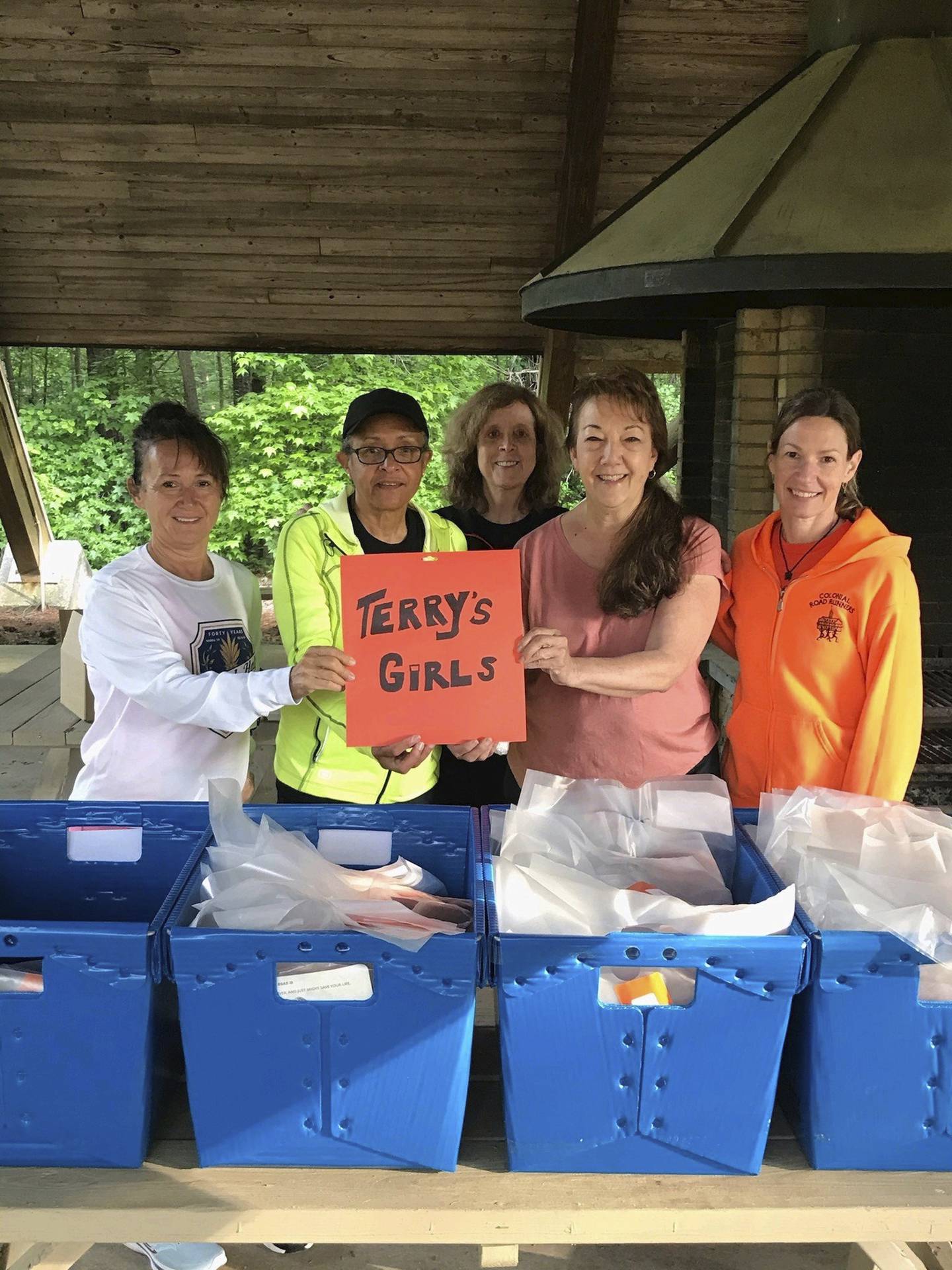 Geri Elder (pink shirt) with her race helpers. Courtesy of Geri Elder