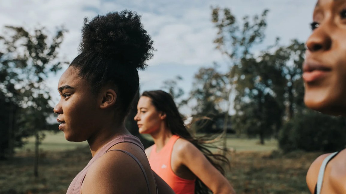 Female runners compete in a race