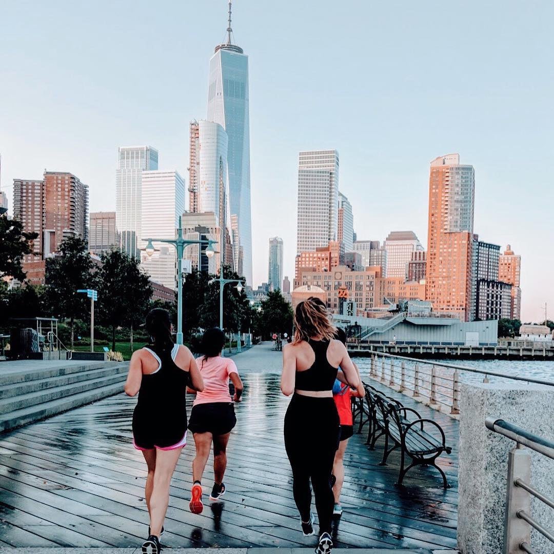 POPSUGAR editor photographed wearing lululemon Swift Speed High-Rise Tights running with group in New York City