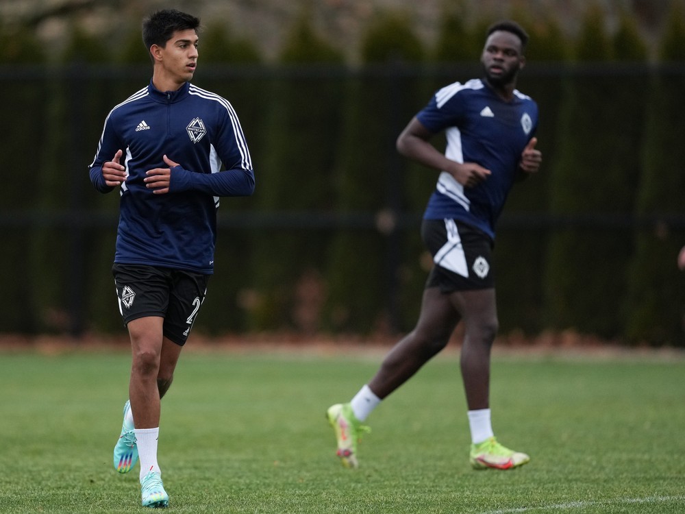 Karifa Yao, right, fell into the Vancouver Whitecaps' lap after Montreal didn't exercise his option after 2022. Yao had dominated the CPL defensively with Calgary for the past two years. At left is Caps defender Mathias Laborda.