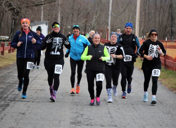 Runners participating in the Frozen Looper at Lakeside Park in Pawling, N.Y., on Sunday, Jan. 22, 2023. (Steve Schallenkamp Photo)