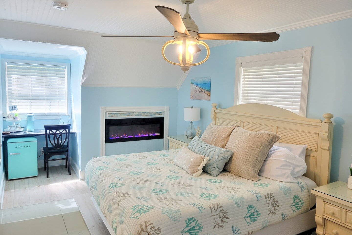 Key West bedroom with coral-print bedding
