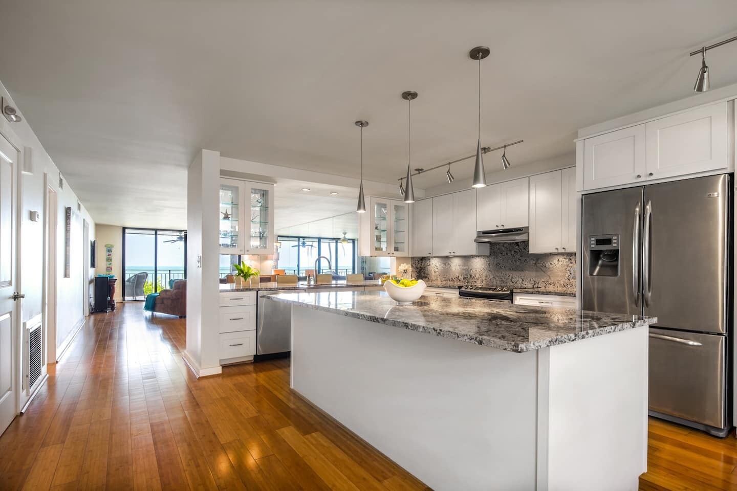 The white kitchen inside an Airbnb condo
