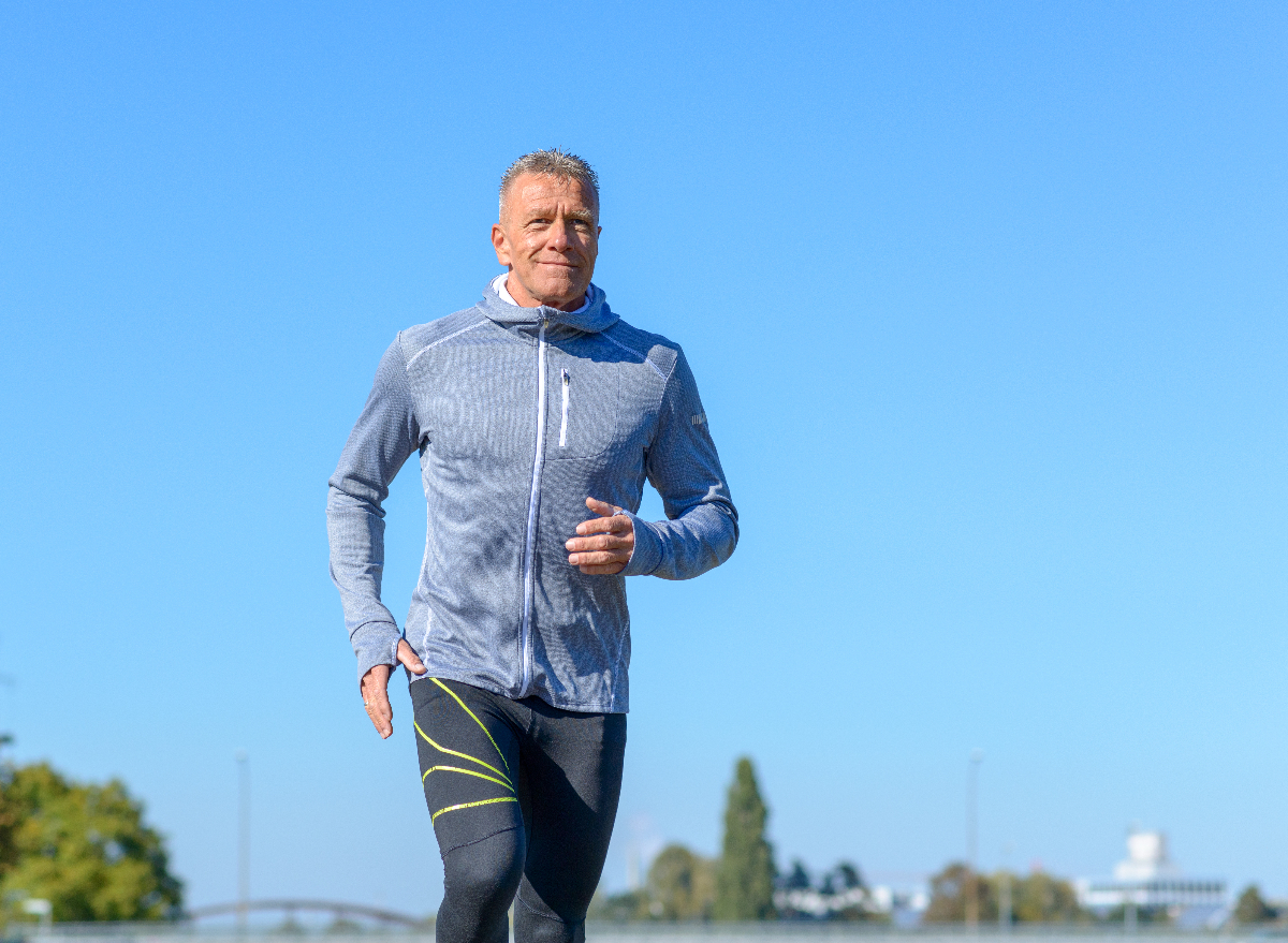 older man running outside following secret exercise tricks