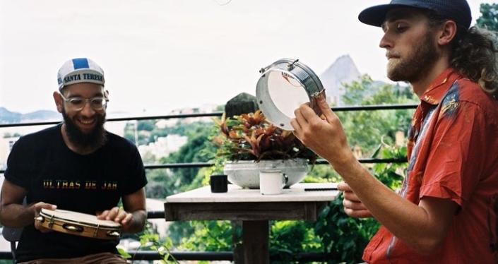 Two men play music outside in Brazil