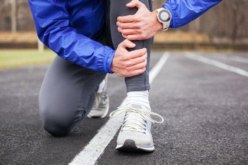 <span class="caption">Shin splints, better known as medial tibial stress syndrome, can be avoided.</span> <span class="attribution"><a class="link " href="https://www.shutterstock.com/image-photo/cropped-shot-young-runner-holding-his-1023221008" rel="nofollow noopener" target="_blank" data-ylk="slk:luckyraccoon/ Shutterstock">luckyraccoon/ Shutterstock</a></span>